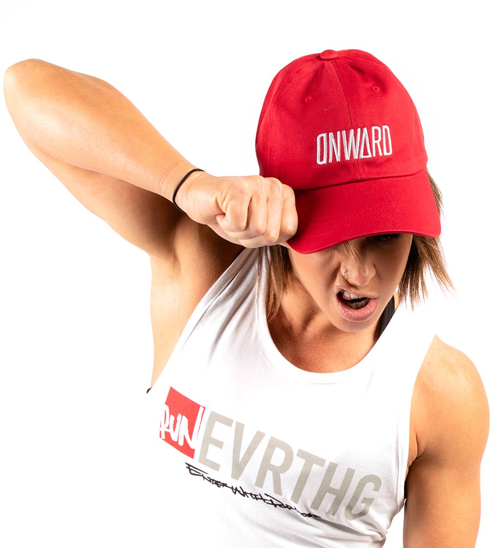 Dana Linn Bailey wearing the red Onward dad hat. 